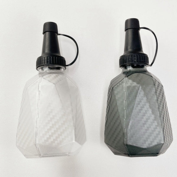 Two Carbon Fiber Pattern Quick-Fill Gel Ball Bottles